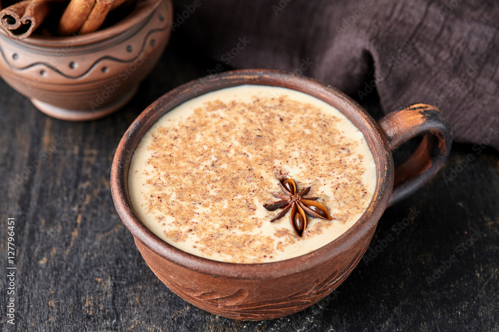 Masala tea chai latte traditional hot Indian sweet milk spiced drink