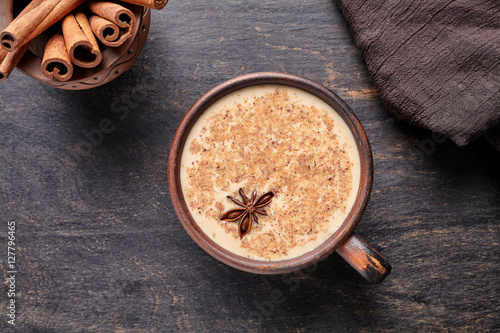 Vászonkép Masala tea chai latte traditional warm Indian sweet milk spiced drink, ginger, c