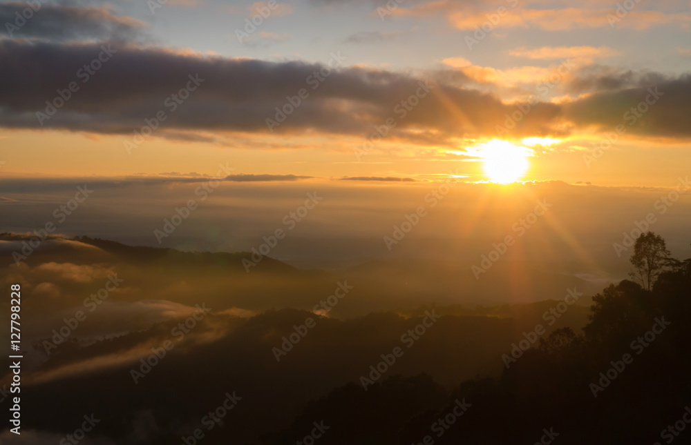 Landscape of  sunrise and moving mist in the mountain and hill. View sunrise  point of mountain at Doi-Montngo, Chiang Mai –Thailand