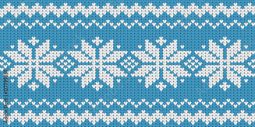 Knitted blue seamless  scandinavian Christmas pattern with snowflakes
