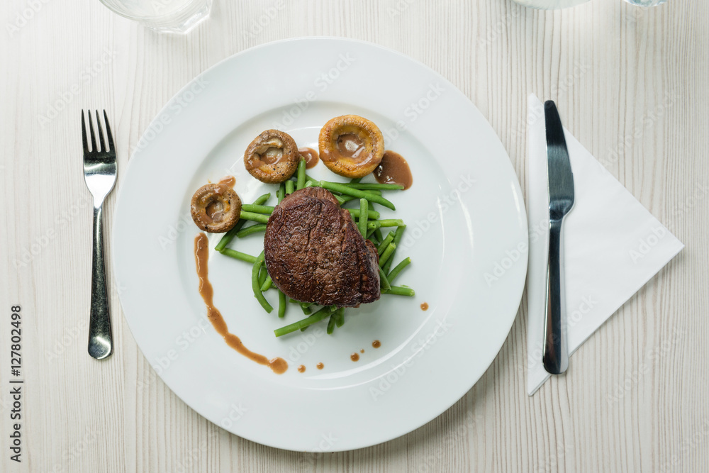 Delicious sirloin steak with green beans