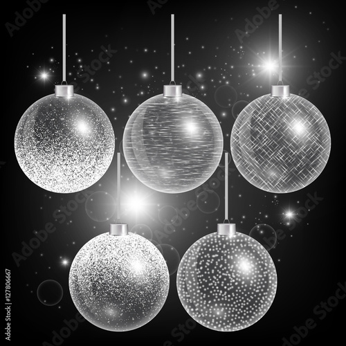Christmas ball isolated. New year decorations. Light effect. Set of holiday elements. Vector illustration of a dark backdrop.
