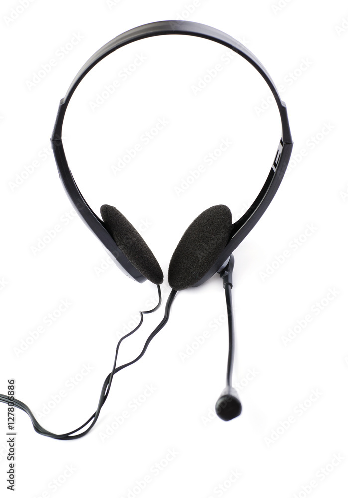 Black computer headset with a microphone isolated over white background Black computer headset with a microphone isolated over white background