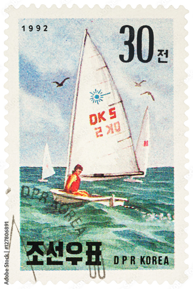 Fototapeta premium Sailboat on postage stamp