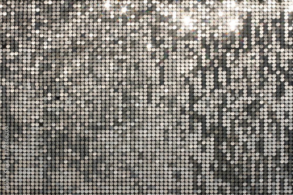 Silver background mosaic with light spots and stars