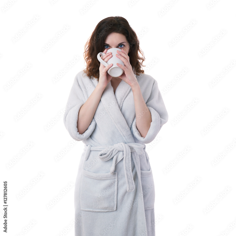 Young woman in bath robe over white isolated background Young woman in bath robe over white isolated background