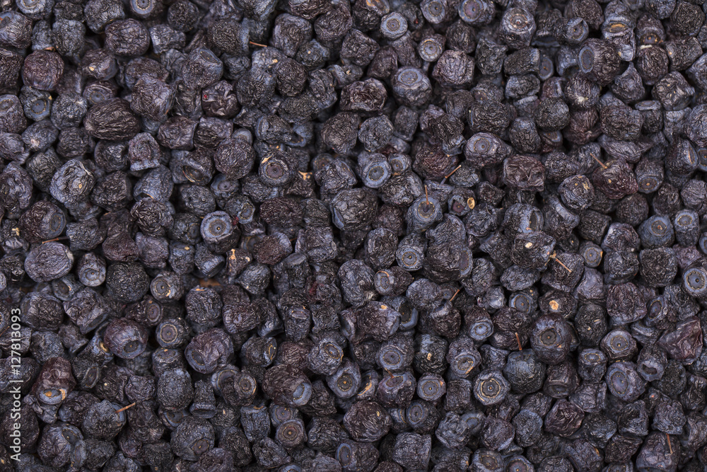 Dried blueberries in plate, close up Dried blueberries in plate, close up