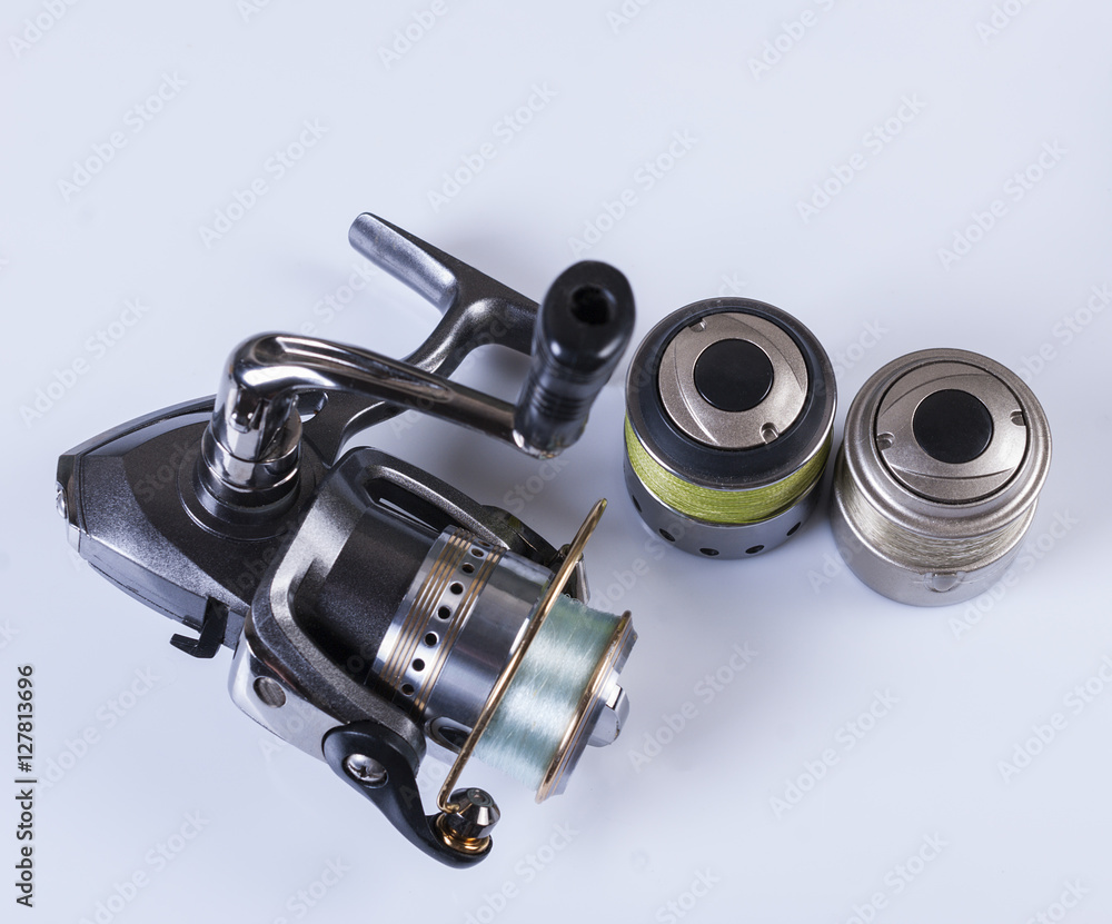 spool of fishing line, floats and a box of hooks spool of fishing line, floats and a box of hooks