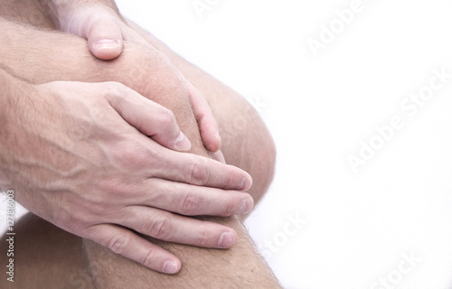 man with knee pain and feeling bad in medical office. Osteoarthritis Knee, osteophyte, subchondral sclerosis. massage for joint pain