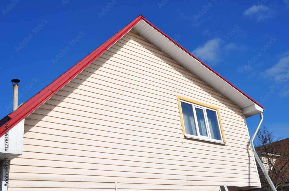 House Construction. Siding House - Vinyl Siding