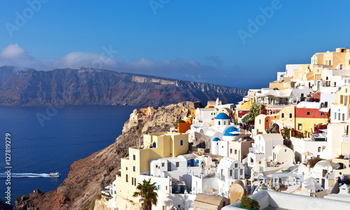  The picturesque Oia village with white Cycladic houses - a favorite place of tourists and photographers