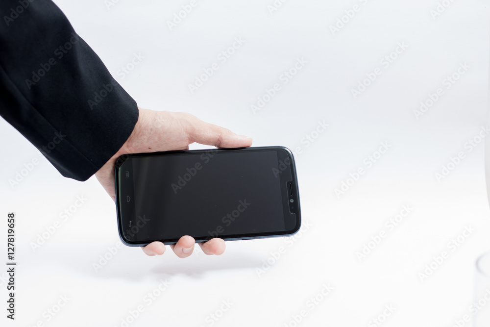 Isolated male hands holding the Smartphone Isolated male hands holding the Smartphone