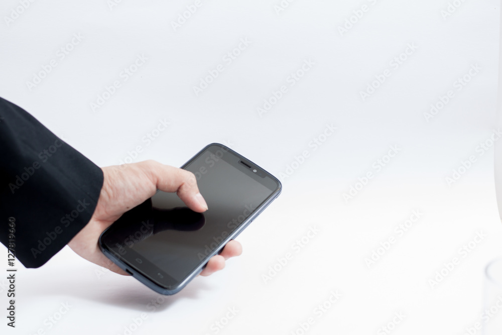 Isolated male hands holding the Smartphone Isolated male hands holding the Smartphone