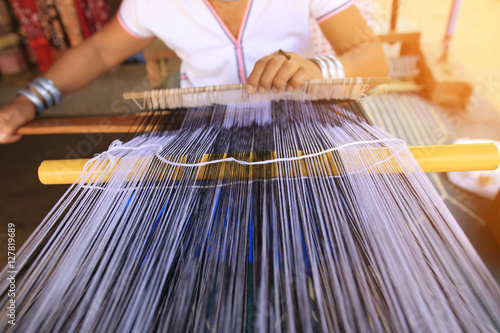 Woman working at the loom.
