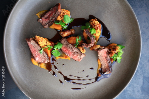 Fototapeta Naklejka Na Ścianę i Meble -  Txogitxu with batat cream, fried chickpeas and peas cress