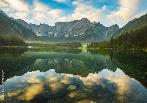 autumn over alpine lake in the Julian Alps, Italy