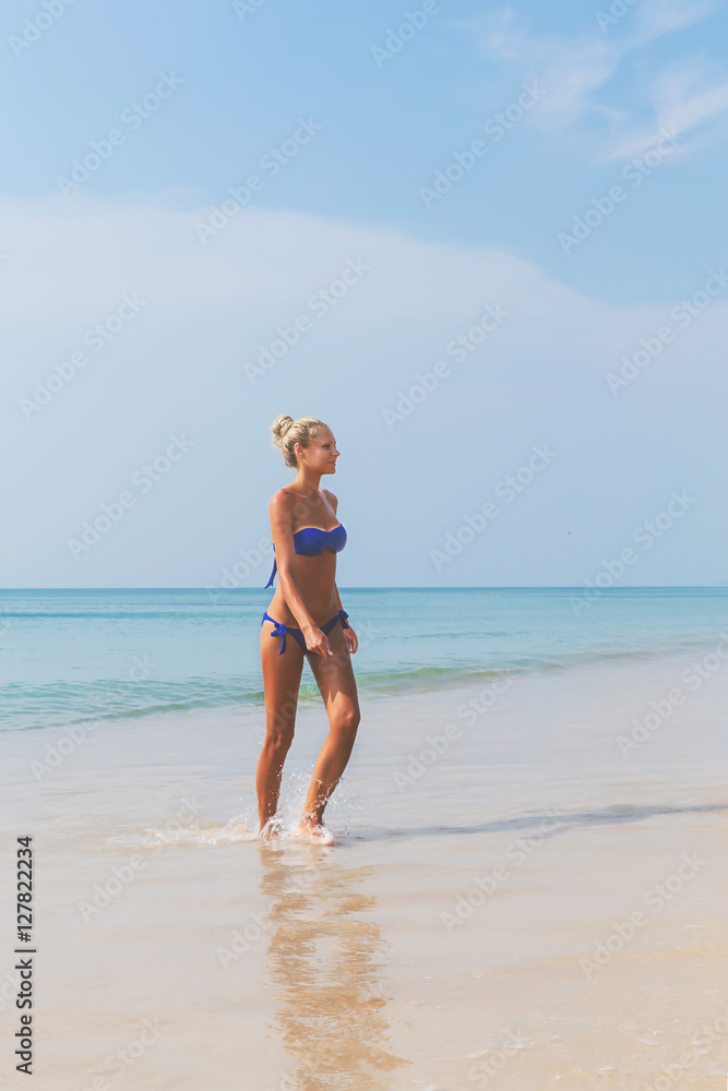 Young slim blonde swimming in sea Young slim blonde swimming in sea