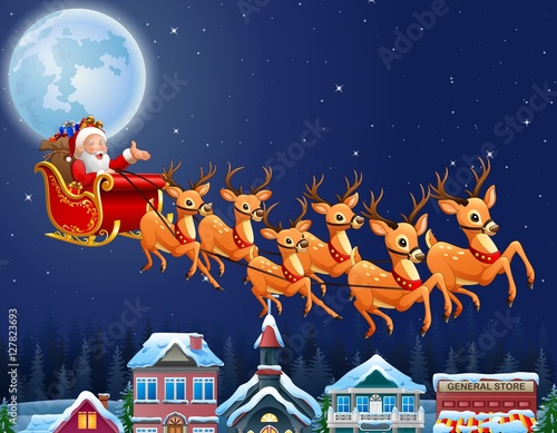 Santa Claus riding his reindeer sleigh flying over town

