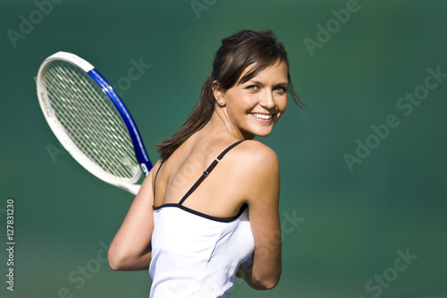 Female Tennis Player Smiles.