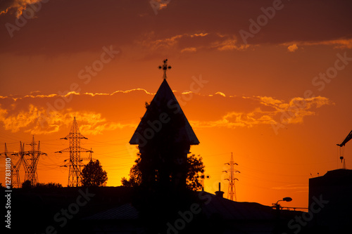 Sunset over the town with church tower  Tulcea  Romania.