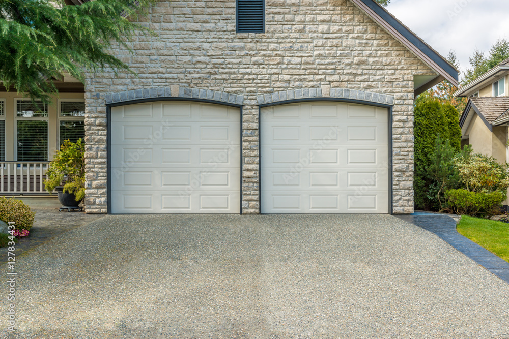 Fototapeta premium Fragment of a luxury house with a garage door in Vancouver, Canada.