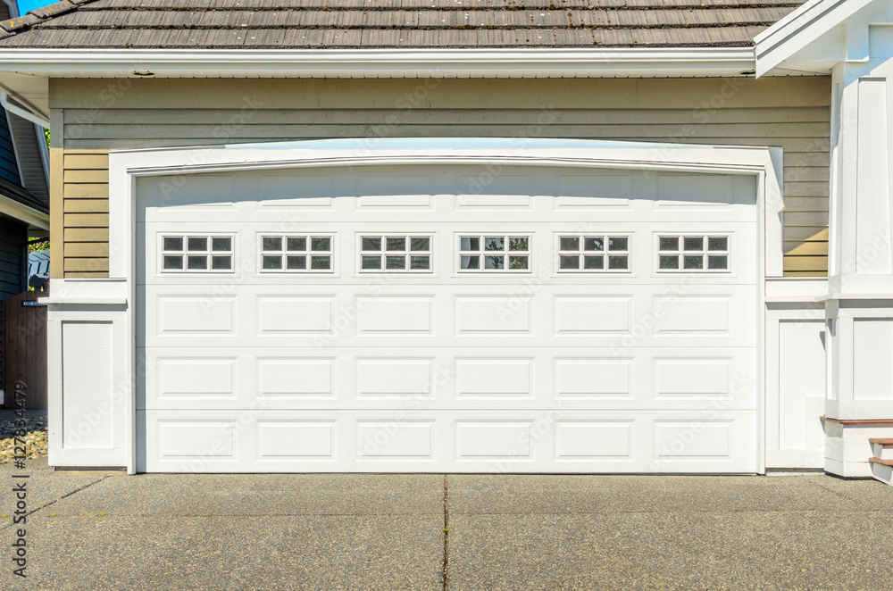 Fototapeta premium Fragment of a luxury house with a garage door in Vancouver, Canada.