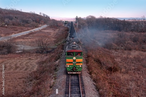  Locomotive carrying wagons with coal