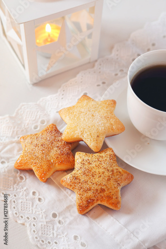  Christmas cookies, coffee and burning lantern