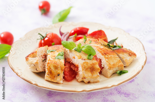 Grilled Chicken breast stuffed with tomatoes, garlic and basil