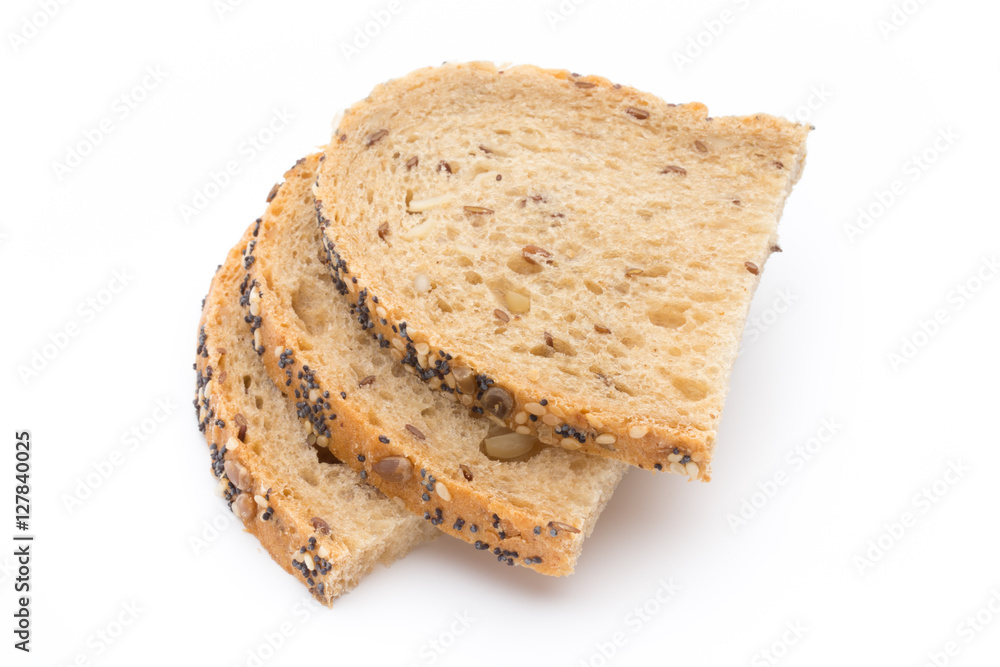 White bread sliced wholegrain bread on a wooden table. White bread sliced wholegrain bread on a wooden table.