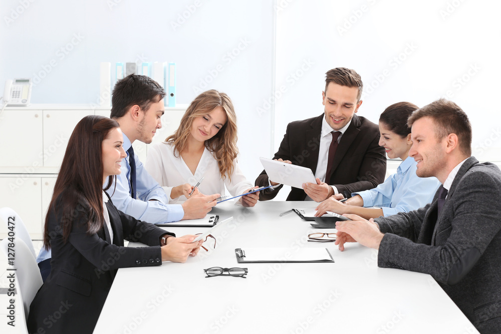 Group of business people working at office Group of business people working at office