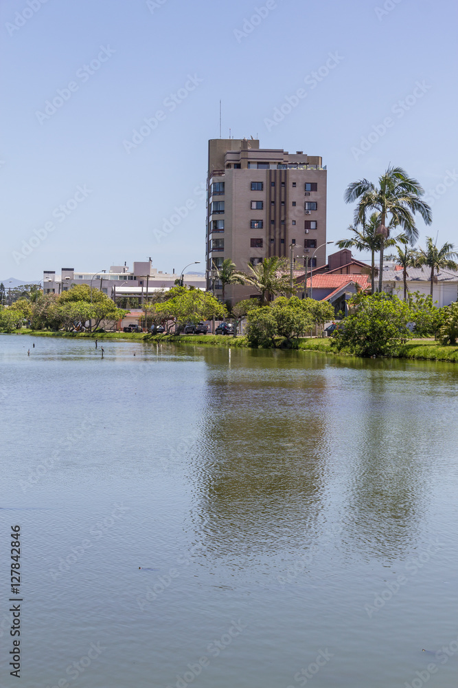 Fototapeta premium Buildings reflecting on the lake in Torres