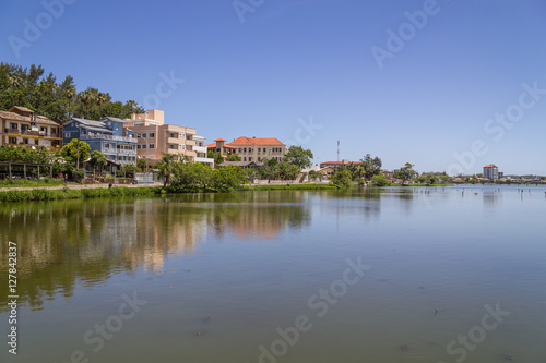 Buildings reflecting on the lake in Torres