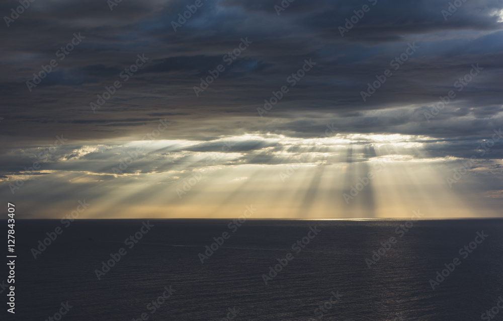 Clouds blue sky and sunlight sunset on horizon ocean . Сloudscape on background seascape dramatic atmosphere rays sunrise. Relax view waves sea, mockup nature evening concept.