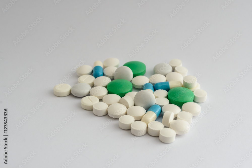 white pills tablets and blue capsule white pills tablets and blue capsule