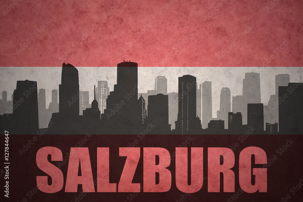 abstract silhouette of the city with text Salzburg at the vintage austrian flag