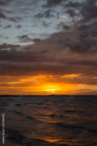 Sunset on the ocean beach © anatoliil