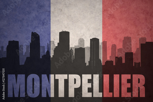 abstract silhouette of the city with text Montpellier at the vintage french flag