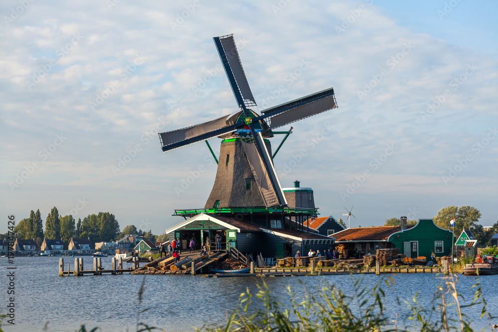 Traditional windmill on the shore of the lake, Holland