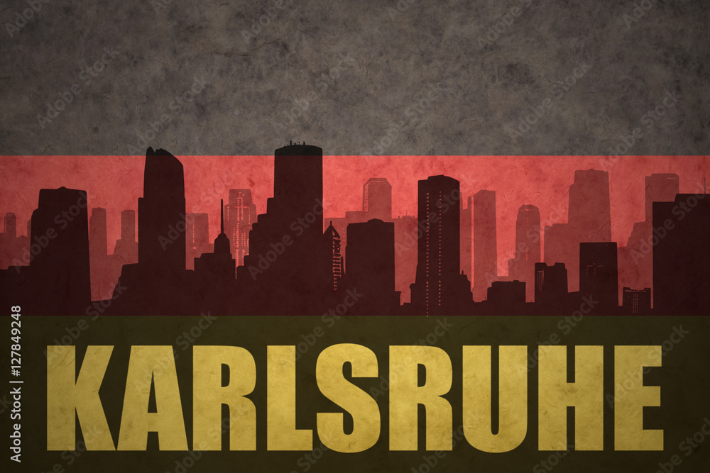 abstract silhouette of the city with text Karlsruhe at the vintage german flag