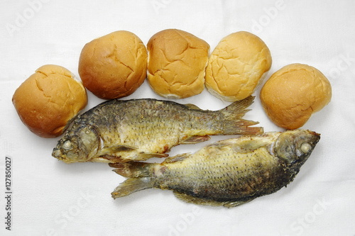 The five loaves, and the two fishes.