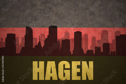 abstract silhouette of the city with text Hagen at the vintage german flag