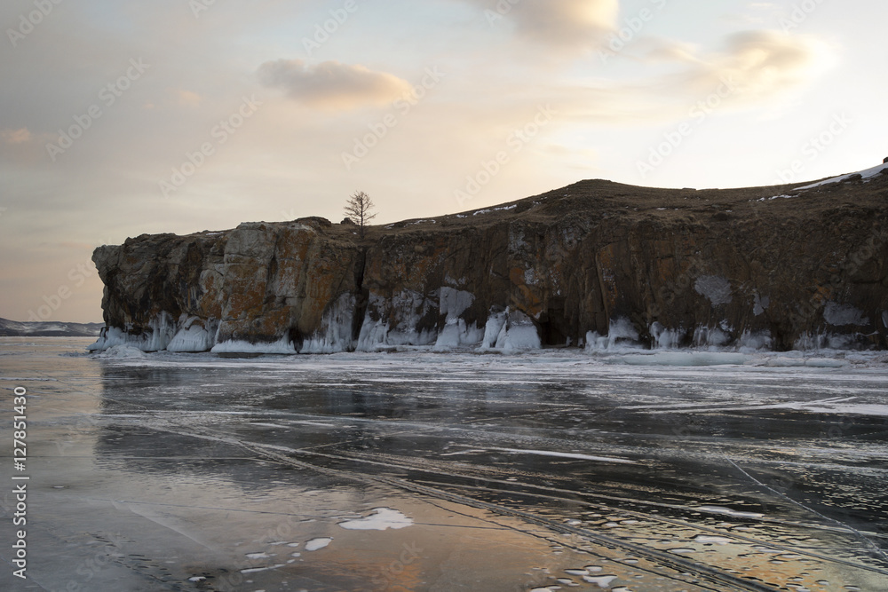 Icy rocks, shore of lake Baikal in winter