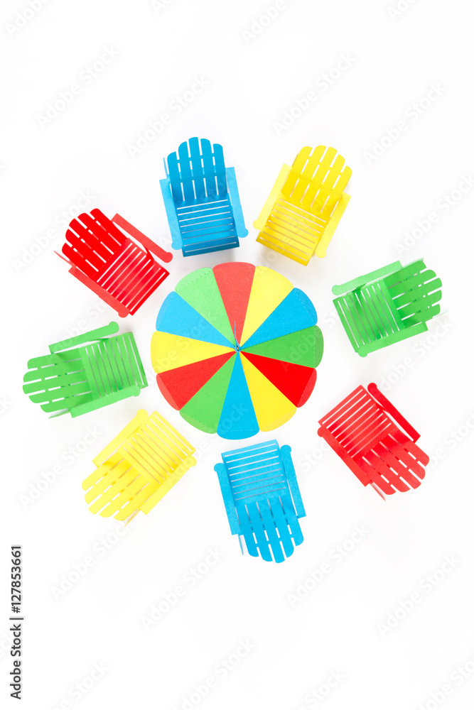 Parasol and deck chairs made of paper on a white background Parasol and deck chairs made of paper on a white background