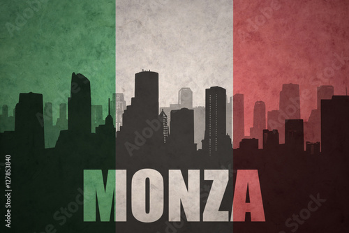 abstract silhouette of the city with text Monza at the vintage italian flag