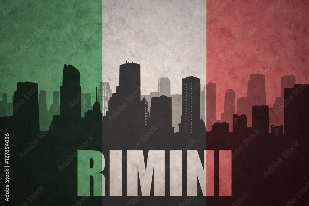 abstract silhouette of the city with text Rimini at the vintage italian flag