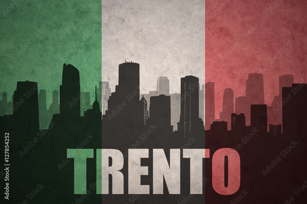 abstract silhouette of the city with text Trento at the vintage italian flag