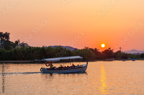 Sunset Scene with Boat, Corfu photo