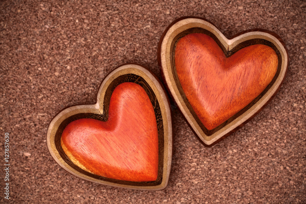 Two wooden hearts on rustic wood background. Valentines days con Two wooden hearts on rustic wood background. Valentines days con