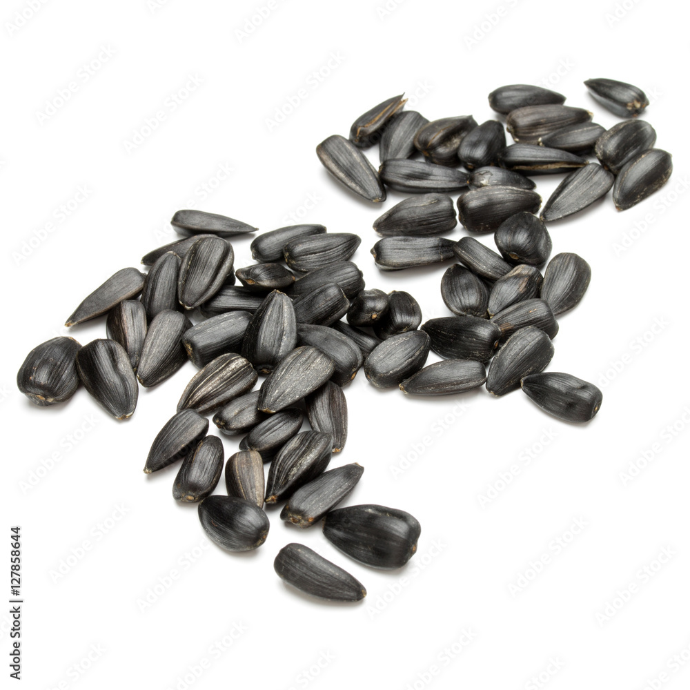 Sunflower seeds isolated on white background close up Sunflower seeds isolated on white background close up